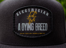 Load image into Gallery viewer, &quot;Electrician - a Dying Breed&quot; Flat Bill Patch Hat
